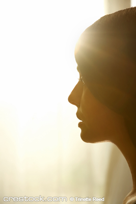 Mysterious profile portrait of woman looking t...