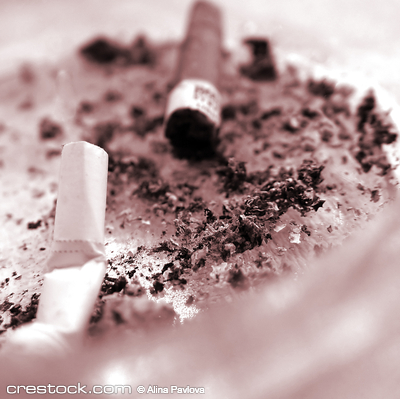 Stubs in an ashtray.rnThe smoking it is harm f...